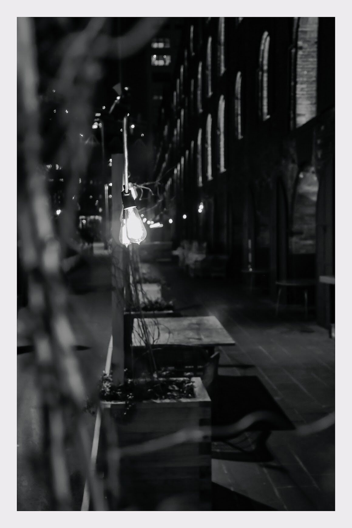 Black and white moody nighttime alley