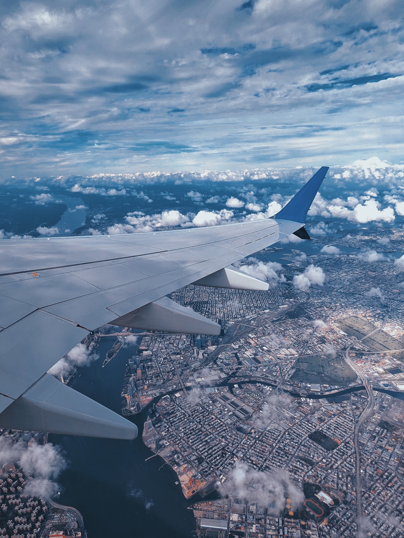 Airplane wing above the clouds