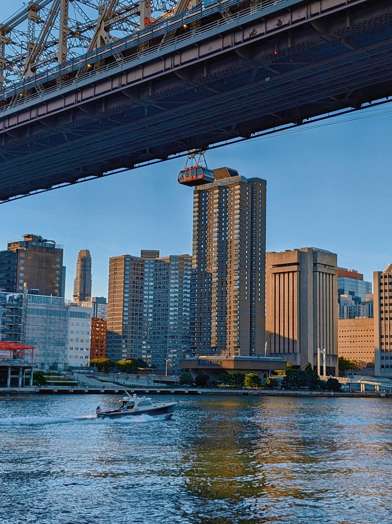 Roosevelt Island tram bridge seen from a waterfront table